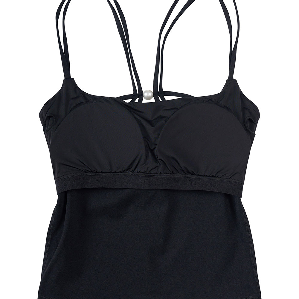 
                      
                        The inside of the Richmond Square Neck Pearl Cross Back top from Stretch Studio London, showcasing internal bra structure for added support and silhouette.
                      
                    